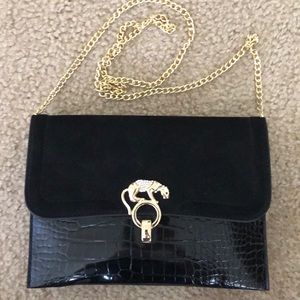 Black cross body / clutch with gold chain